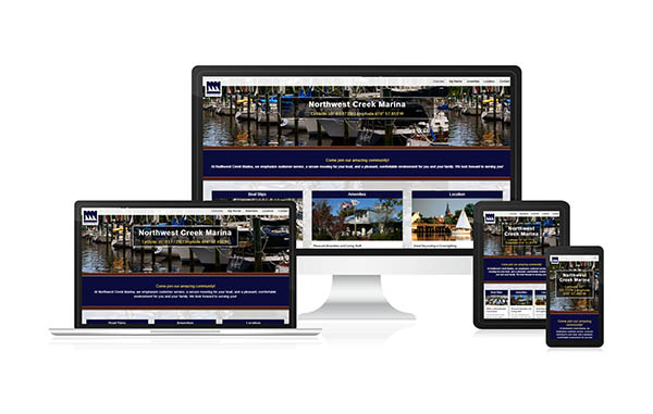 Northwest Creek Marina's new mobile responsive website design displayed on a phone, desktop, laptop, and tablet